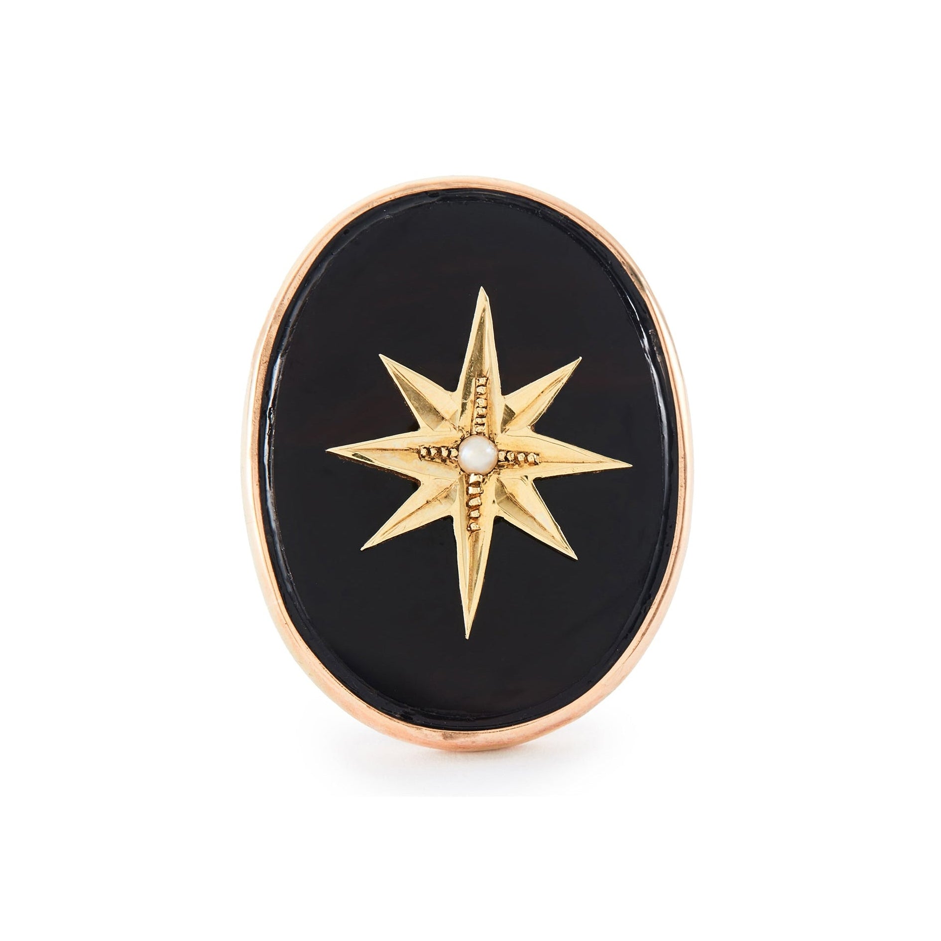 Magnificent 9ct rose gold ring set with a Victorian oval onyx disk, embellished with a 15ct yellow gold star and centre seed pearl. Later shank.