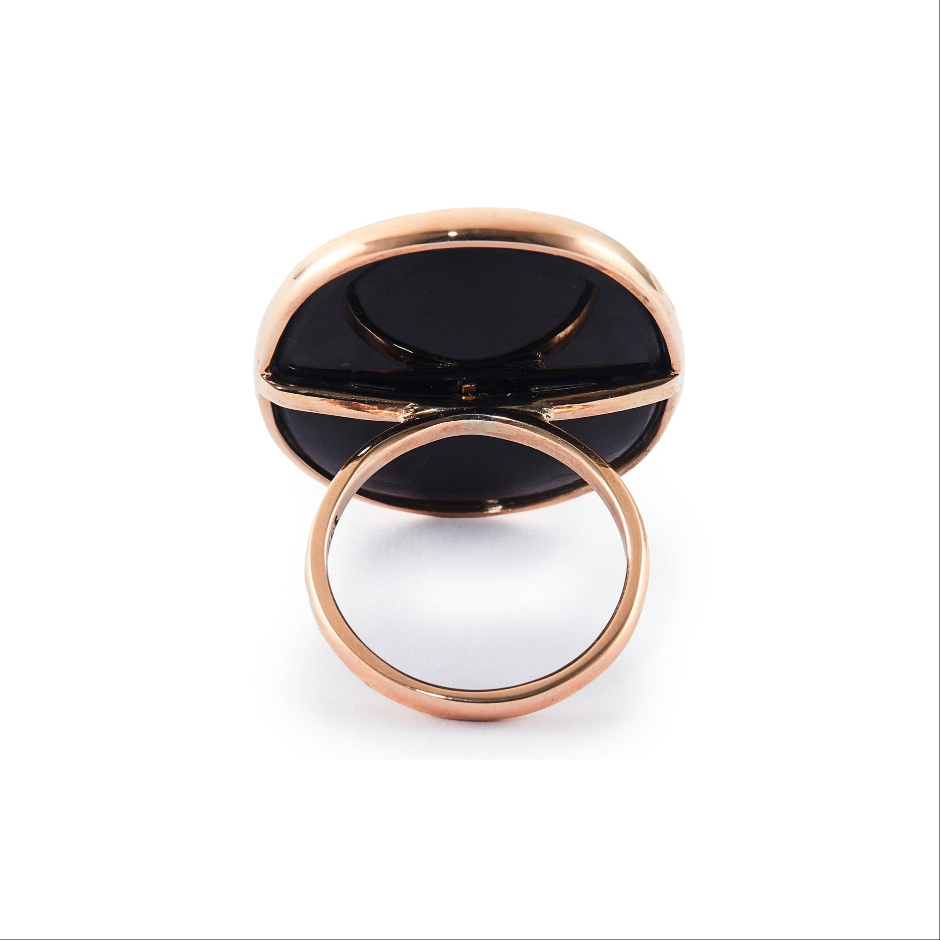 Magnificent 9ct rose gold ring set with a Victorian oval onyx disk, embellished with a 15ct yellow gold star and centre seed pearl. Later shank.
