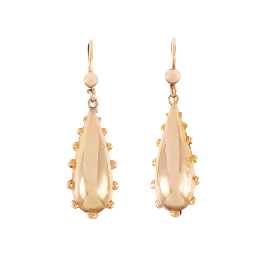 Classic 9ct gold earrings with dangling repoussé drops. The earrings are hollow so not too heavy on the ear.