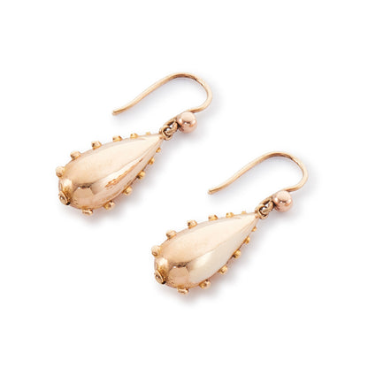 Classic 9ct gold earrings with dangling repoussé drops. The earrings are hollow so not too heavy on the ear.