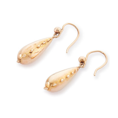 Classic 9ct gold earrings with dangling repoussé drops. The earrings are hollow so not too heavy on the ear.