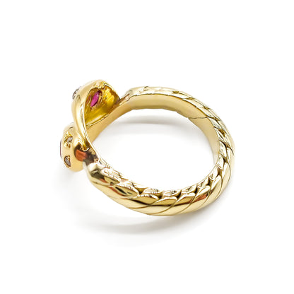 Stunning Victorian 9ct gold snake ring set with two rubies and six old-cut diamonds.