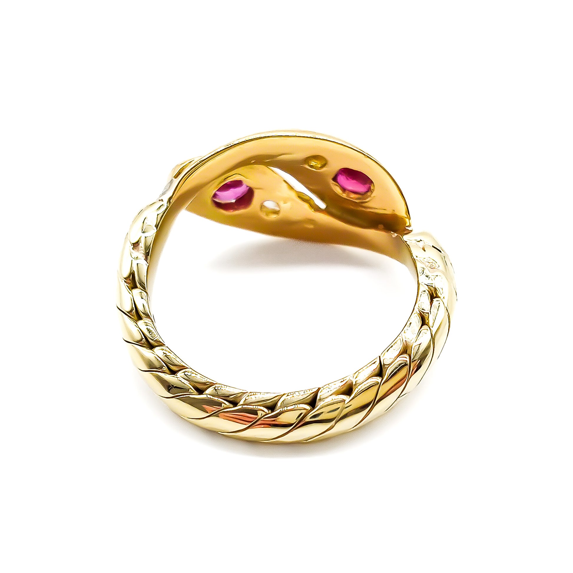 Stunning Victorian 9ct gold snake ring set with two rubies and six old-cut diamonds.