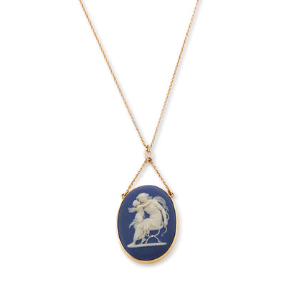 Pretty Victorian 9ct yellow gold pendant, tube-set with a beautiful blue Wedgwood cameo depicting Artemis/Diana embracing a cherub, on a dainty 9ct gold chain.