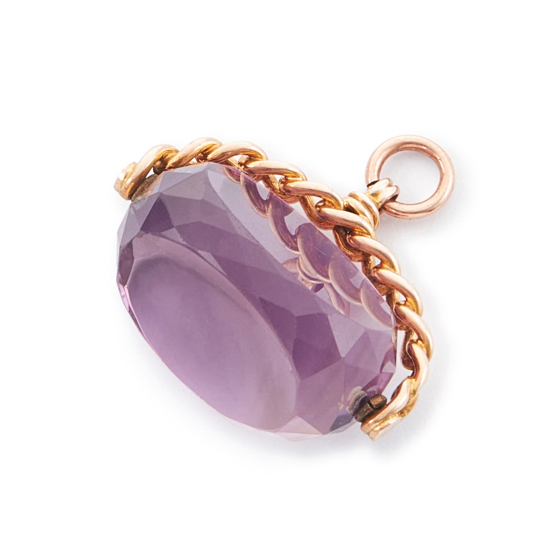Beautiful Victorian faceted swivel fob in a 9ct rose gold setting with a rope design.