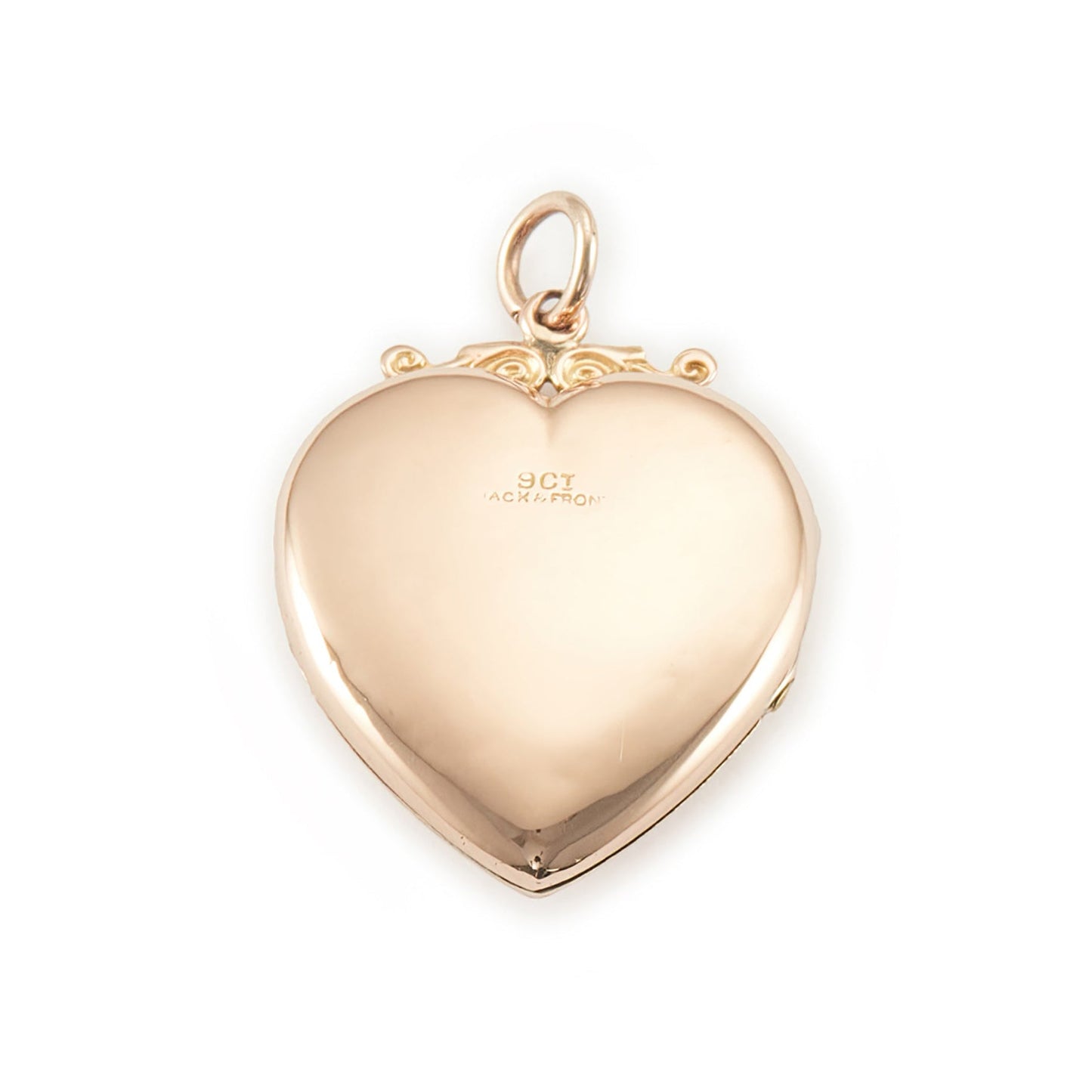 Lovely Victorian rose gold back and front puffy heart locket with a small mine-cut diamond in a star setting. Locket can take two photographs.
