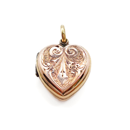 Lovely 9ct rose gold Victorian back and front locket with beautiful engraving on both sides.