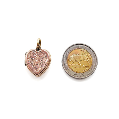 Lovely 9ct rose gold Victorian back and front locket with beautiful engraving on both sides.