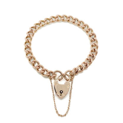 Classic Victorian 9ct solid rose gold curb link bracelet with a padlock and safety chain.