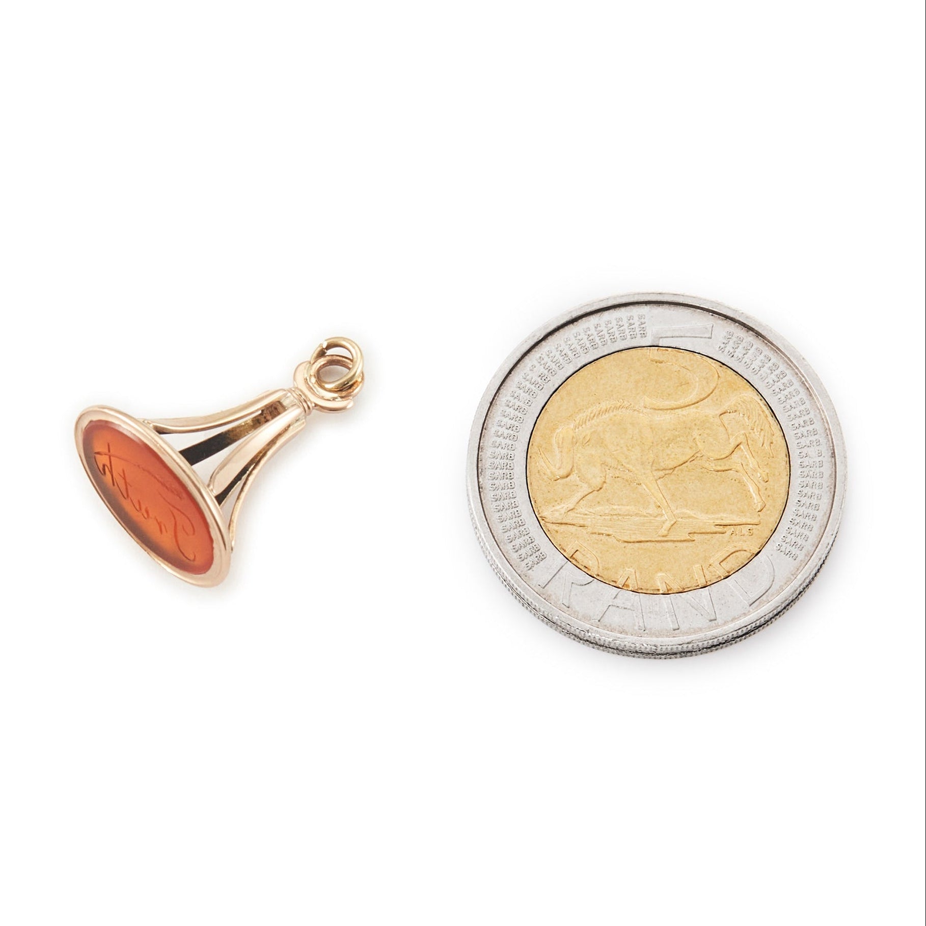 Classic Victorian 9ct rose gold fob seal set with a carnelian intaglio.