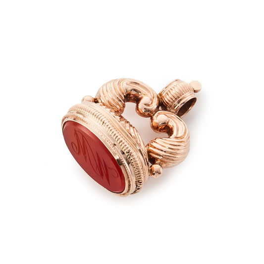 Victorian 9ct rose gold seal with intricate detail set with a carved carnelian stone.