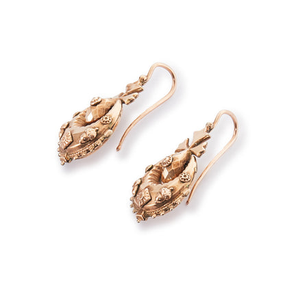 Exquisite 9ct rose gold Victorian dangling drop earrings with intricate repoussé details.