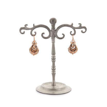 Exquisite 9ct rose gold Victorian dangling drop earrings with intricate repoussé details.