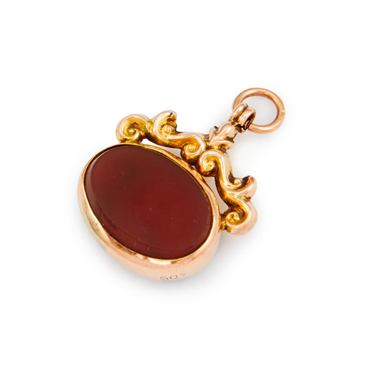 Quaint miniature Victorian 9ct rose gold fob with repoussé design, set with a bloodstone on one side and a carnelian on the other side.