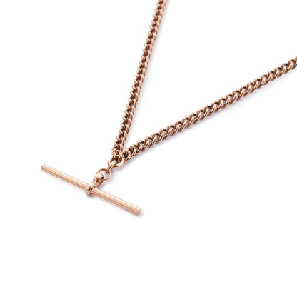 Classic Victorian 9ct rose gold curb link fob chain with a dog clip and t-bar. The chain consists of solid links and has a nice length to it.