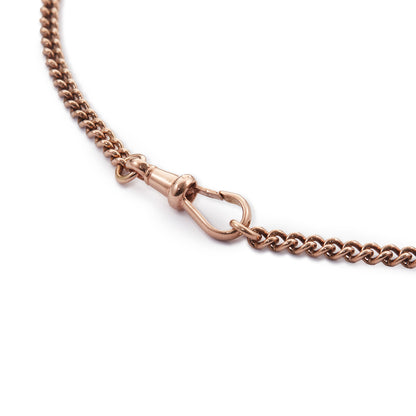 Classic Victorian 9ct rose gold curb link fob chain with a dog clip and t-bar. The chain consists of solid links and has a nice length to it.