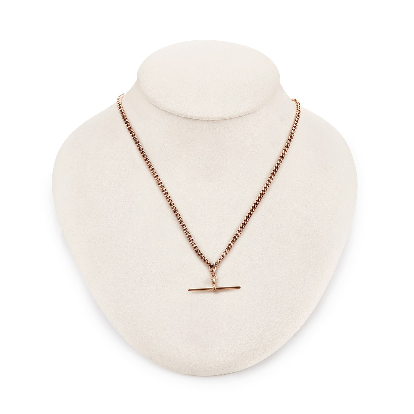 Classic Victorian 9ct rose gold curb link fob chain with a dog clip and t-bar. The chain consists of solid links and has a nice length to it.