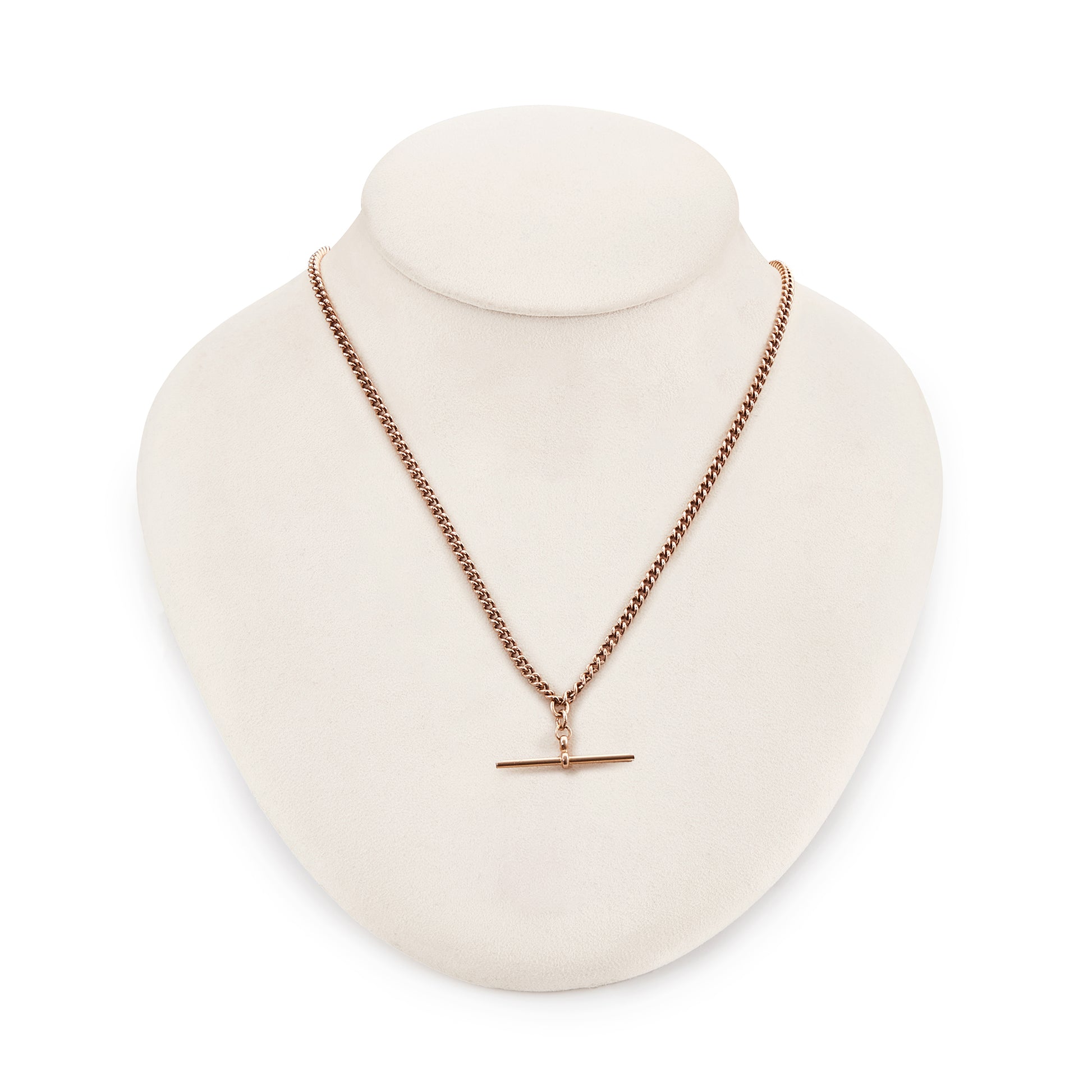 Classic Victorian 9ct rose gold curb link fob chain with a dog clip and t-bar. The chain consists of solid links and has a nice length to it.