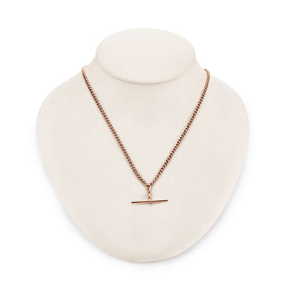 Classic Victorian 9ct rose gold curb link fob chain with a dog clip and t-bar. The chain consists of solid links and has a nice length to it.