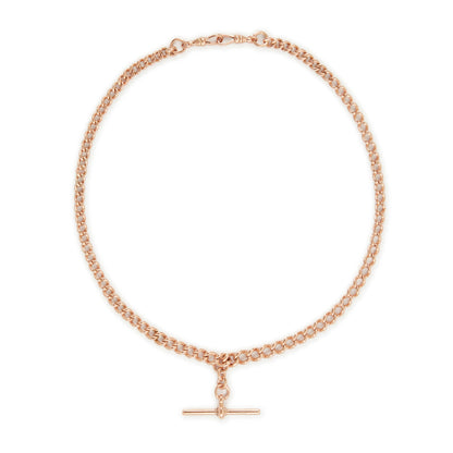 Classic Victorian 9ct rose gold graduated curb link fob chain with two dog clips and a T-bar.