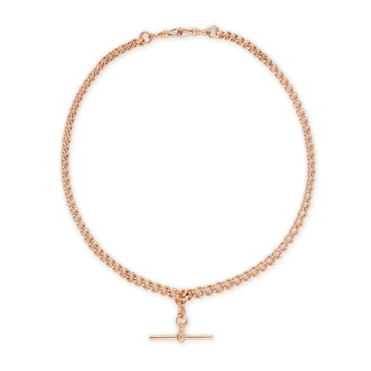 Classic Victorian 9ct rose gold graduated curb link fob chain with two dog clips and a T-bar.