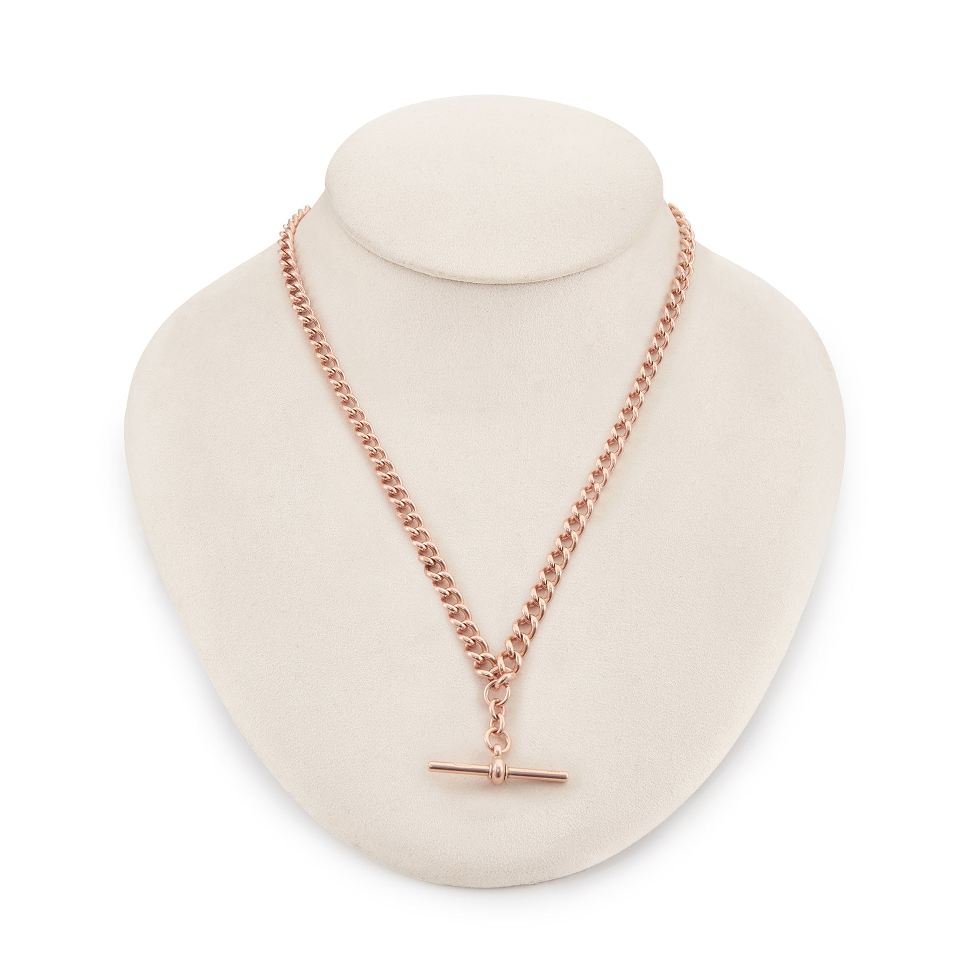 Classic Victorian 9ct rose gold graduated curb link fob chain with two dog clips and a T-bar.