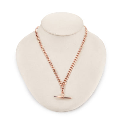 Classic Victorian 9ct rose gold graduated curb link fob chain with two dog clips and a T-bar.
