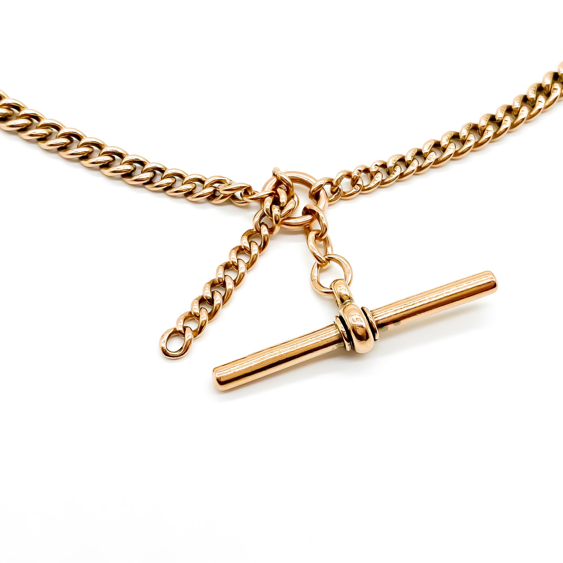 Classic Victorian 9ct rose gold curb link fob chain with two dog-clips and a t-bar. Every link is stamped.