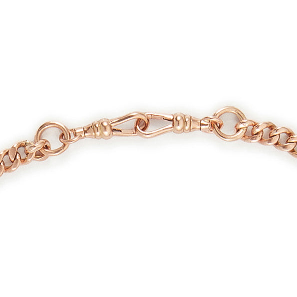 Classic Victorian 9ct rose gold graduated curb link fob chain with two dog clips and a T-bar.