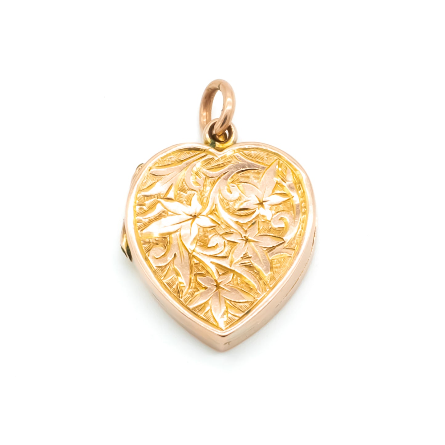 Beautifully engraved Victorian heart-shaped rose gold locket with lovely floral engraving on both sides.