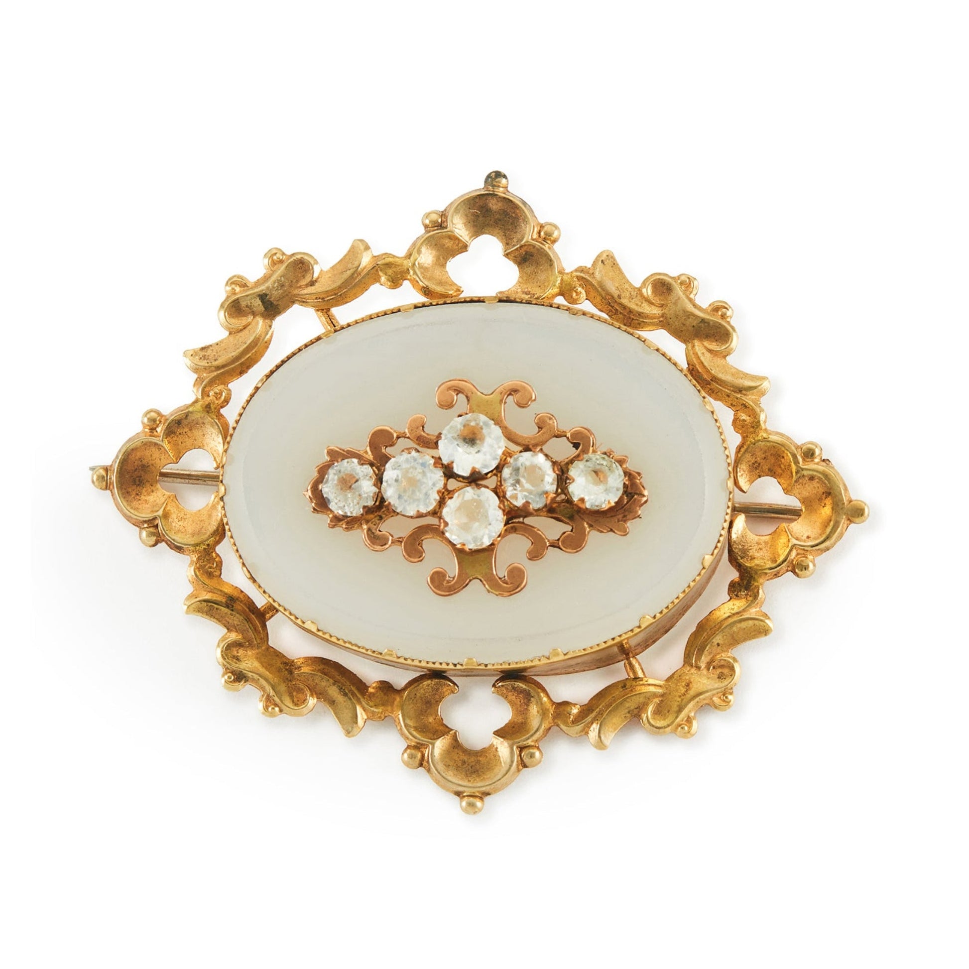 Pretty Victorian pinchbeck brooch with an oval agate disc in an ornate frame, adorned with white spinels.