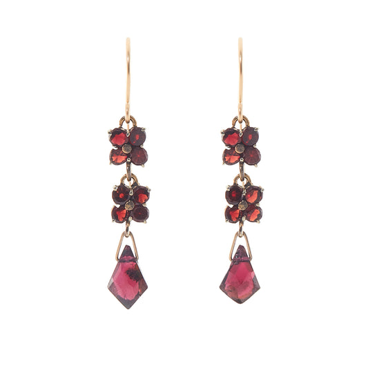 Pretty Victorian gold-filled dangling earrings set with deep red faceted garnets. Hooks replaced.