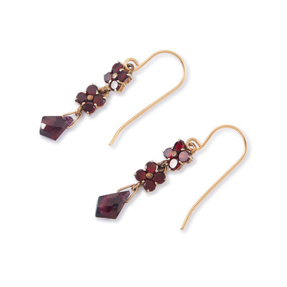 Pretty Victorian gold-filled dangling earrings set with deep red faceted garnets. Hooks replaced.