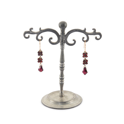 Pretty Victorian gold-filled dangling earrings set with deep red faceted garnets. Hooks replaced.