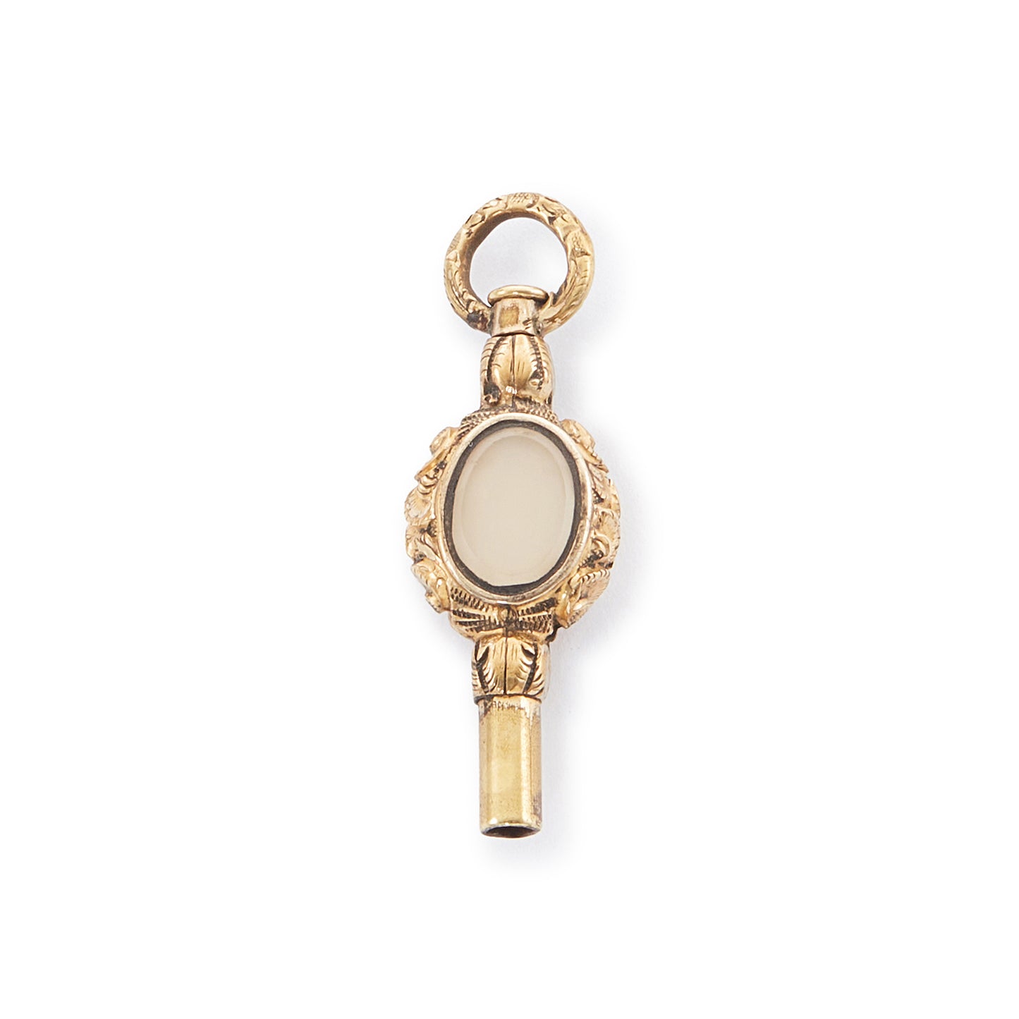 Quaint miniature Victorian gold-plated watch key set with an amethyst on one side and white agate on the other.
