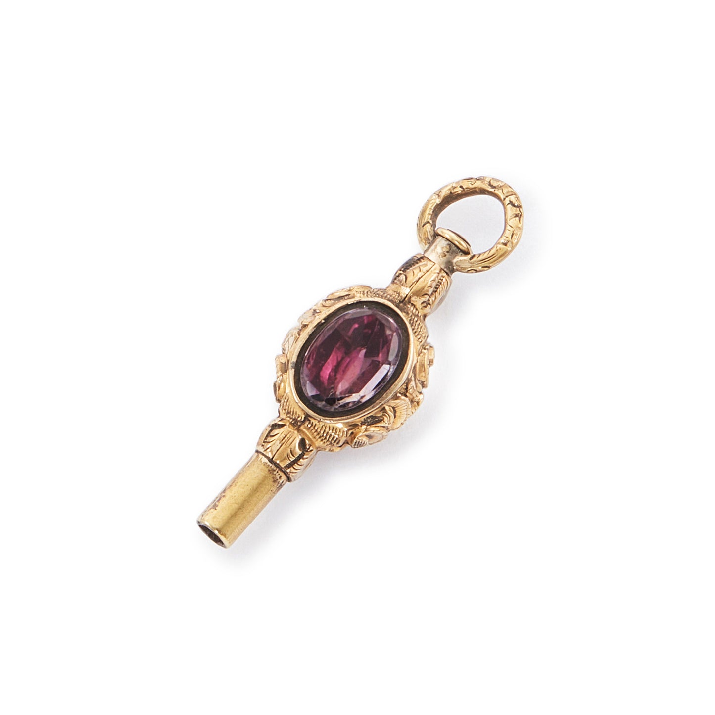Quaint miniature Victorian gold-plated watch key set with an amethyst on one side and white agate on the other.