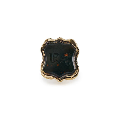 Small Victorian gold cased bloodstone seal with ornate detail.