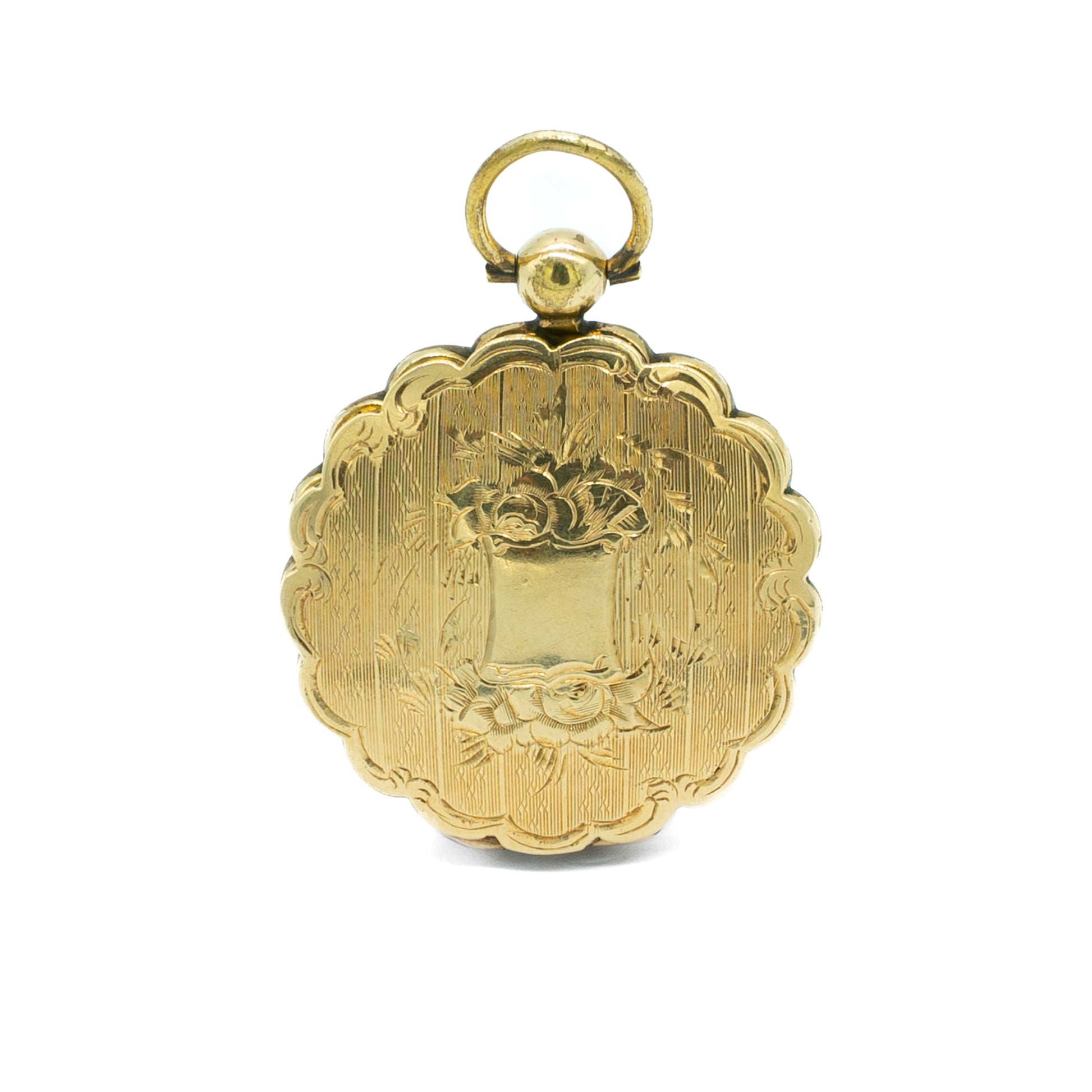 Pretty Victorian gold cased pendant with beautiful engraving.