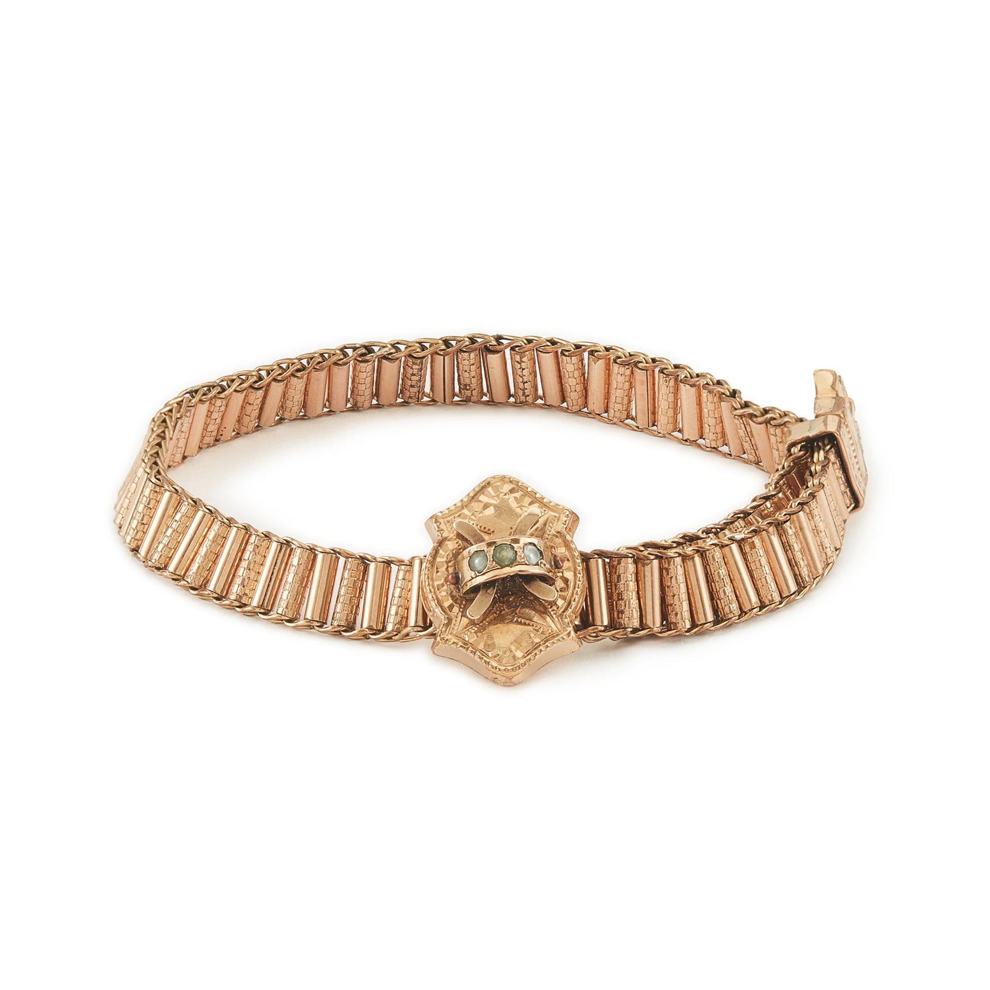 Beautiful Victorian rose gold cased slider bracelet set with three seed pearls. Lovely engraving on the centre piece. Size adjustable.