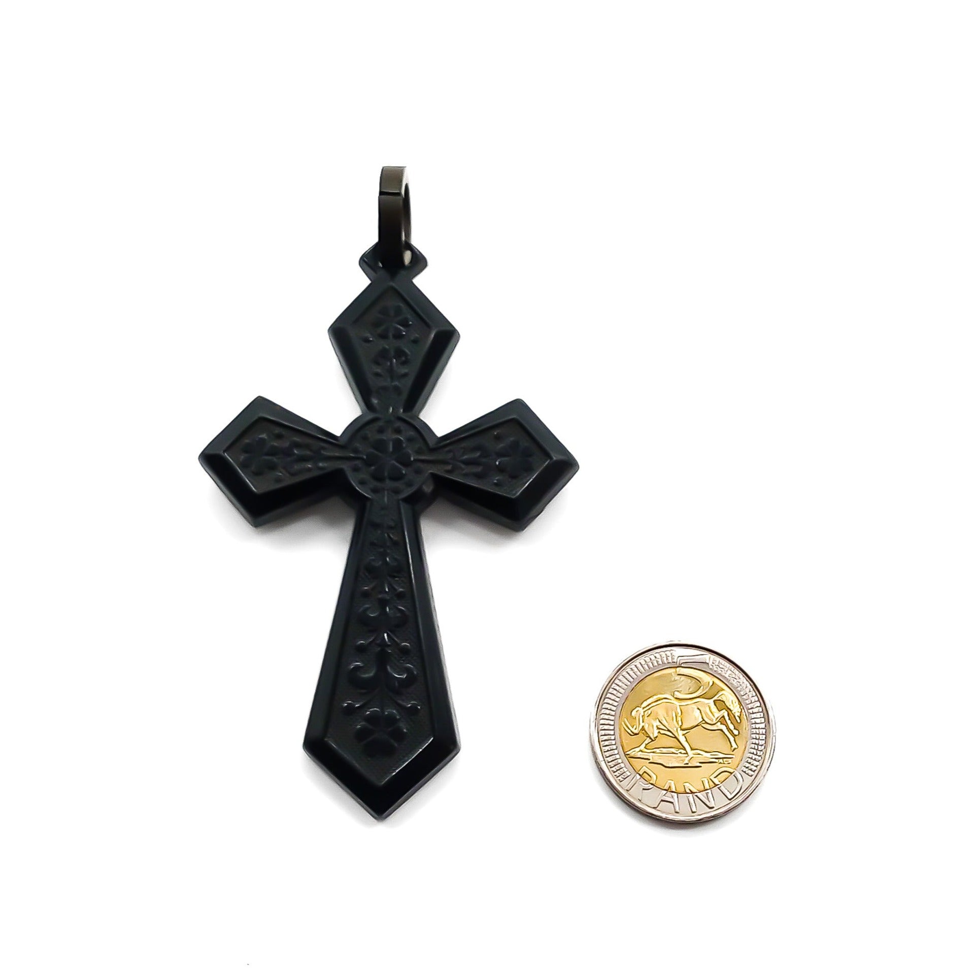 Large beautifully carved Victorian jet cross pendant.