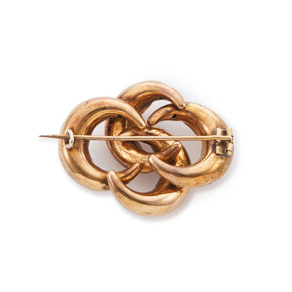 Classic Victorian pinchbeck love knot brooch with fine engraving. 