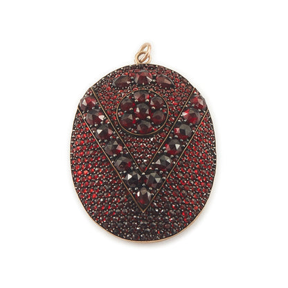 Exquisite Victorian rolled rose gold picture locket set with a beautiful selection of deep red Bohemian garnets.