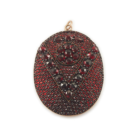 Exquisite Victorian rolled rose gold picture locket set with a beautiful selection of deep red Bohemian garnets.