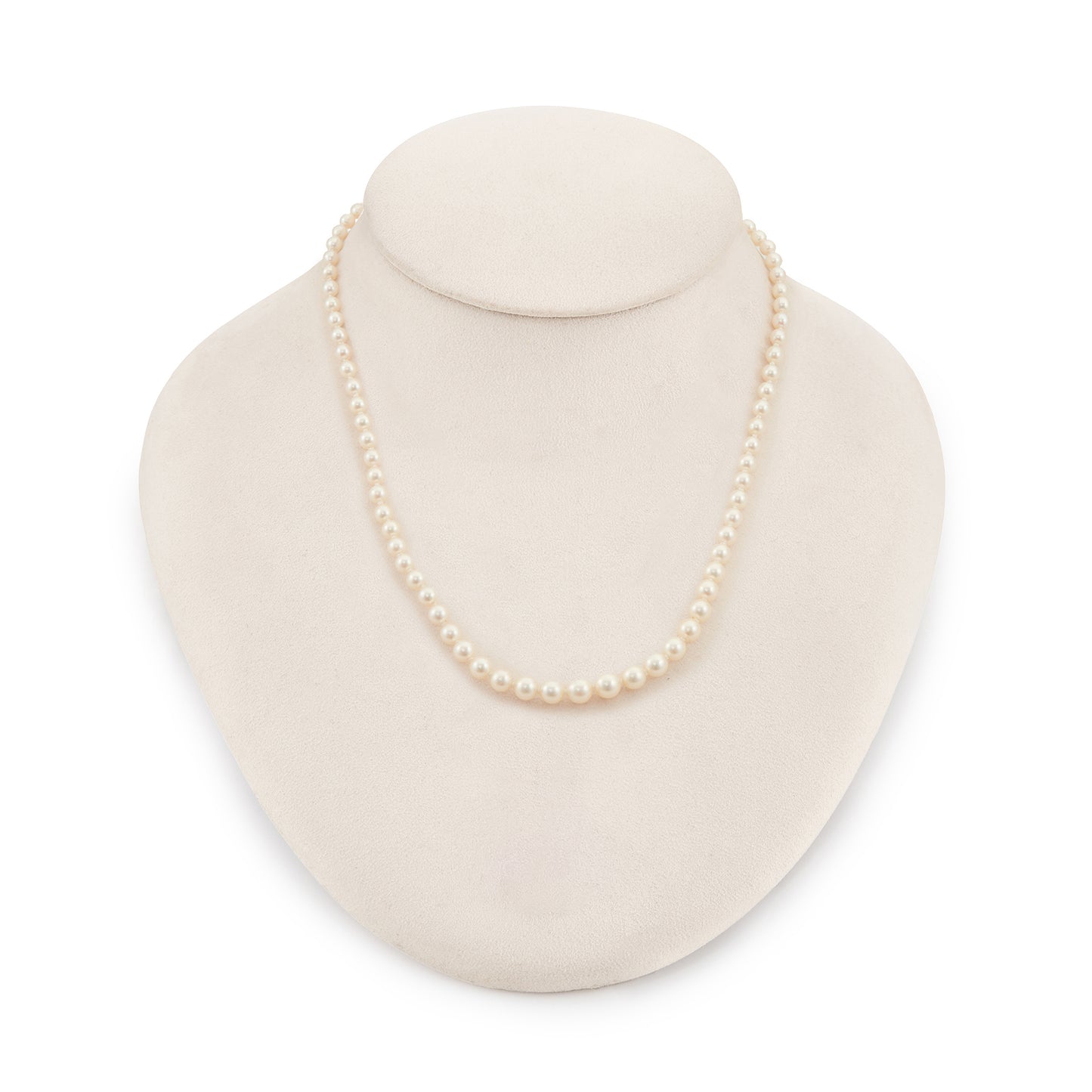 Pretty Victorian string of white graduated seawater pearls with a 9ct rose gold clasp. The pearls have a magnificent lustre.