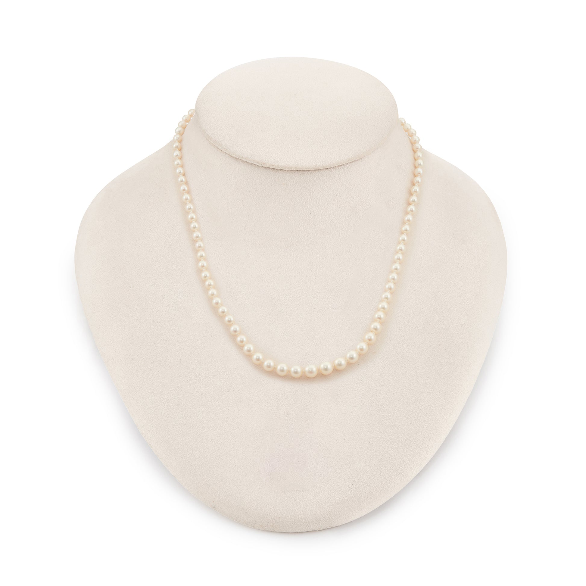 Pretty Victorian string of white graduated seawater pearls with a 9ct rose gold clasp. The pearls have a magnificent lustre.