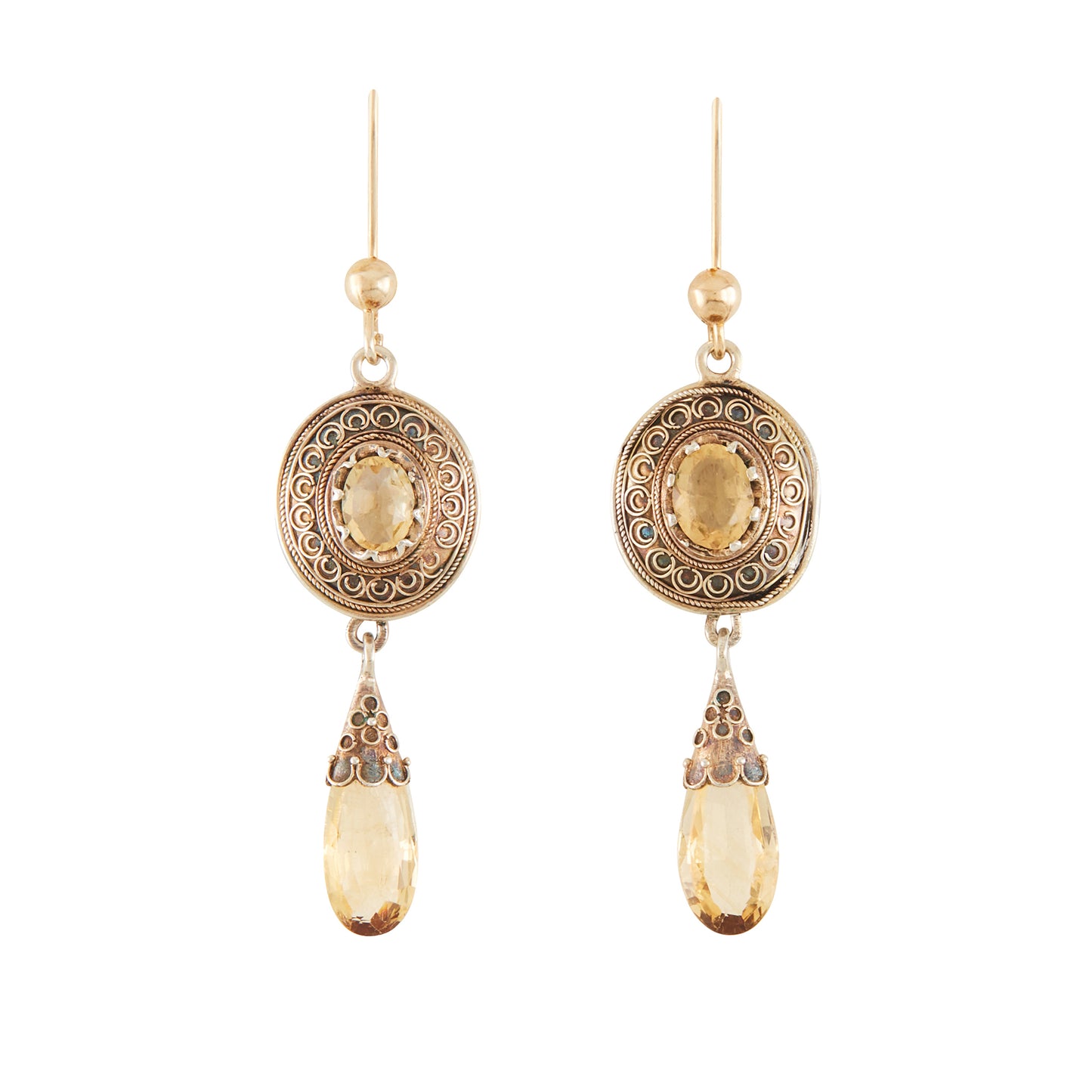 Gorgeous Victorian silver-gilt earrings, each set with a beautifully faceted citrine and a dangling citrine drop. The earrings feature beautiful scroll work detail on the metal.