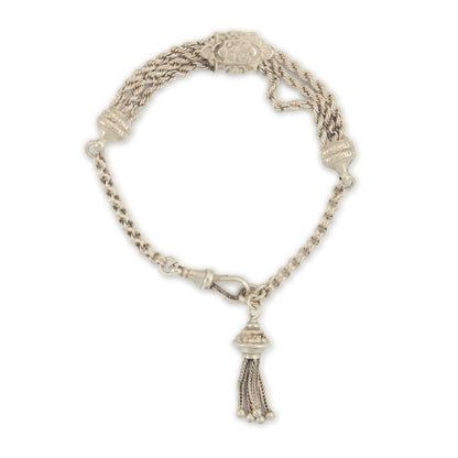 Pretty Victorian silver albertina bracelet with ornate detail, a tassel and a dog clip.