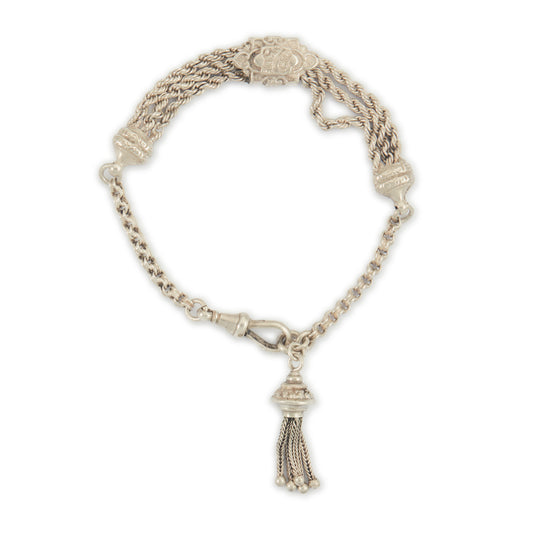 Pretty Victorian silver albertina bracelet with ornate detail, a tassel and a dog clip.