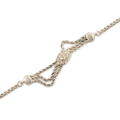 Pretty Victorian silver albertina bracelet with ornate detail, a tassel and a dog clip.