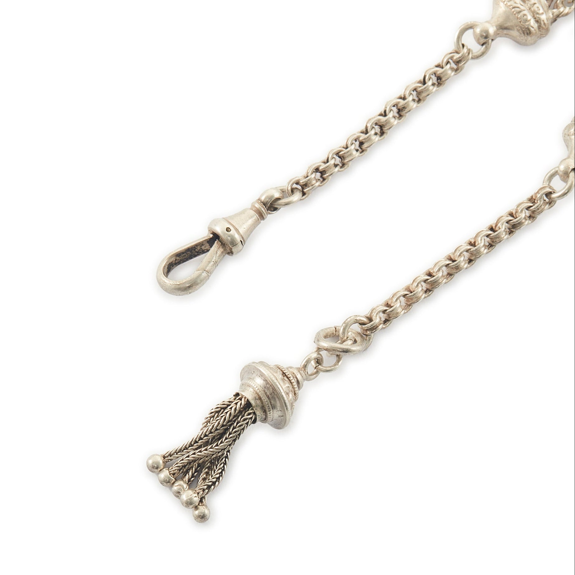 Pretty Victorian silver albertina bracelet with ornate detail, a tassel and a dog clip.